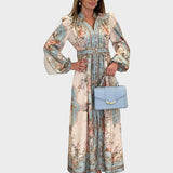 Meda – Robe longue élégante à fleurs avec des boutons