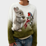Lucy - Pull en peluche avec un lapin de Noël