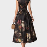 Elsa - Robe midi plissée à motif floral