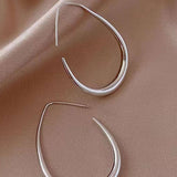 Boucles d'Oreilles Ovales en Métal